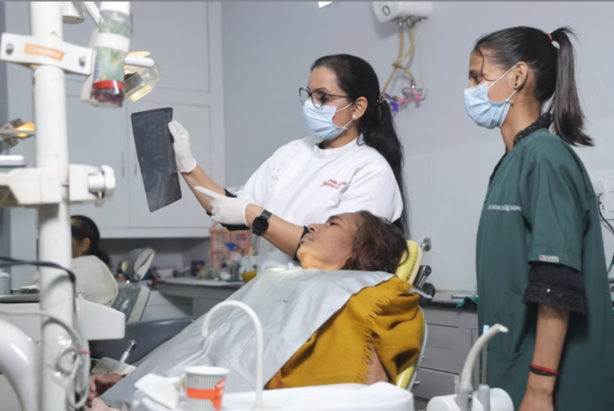 Dental professionals treating a patient at Dr Arora's Dental Square